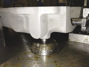 Photo of conventional, less effective grippers for part manipulation