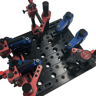 Photo of a universal fixture kit, an ideal option with Blue Photon's UV-activated adhesive gripper workholding system