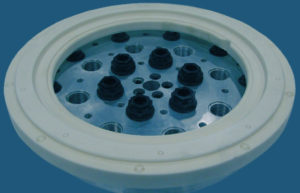 Photo of a ceramic part, showing how Blue Photon can hold fragile materials with reduced waste and lessened chance of breakage